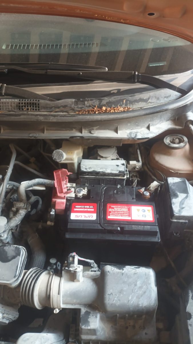 Car battery fitted under the bonnet of a car